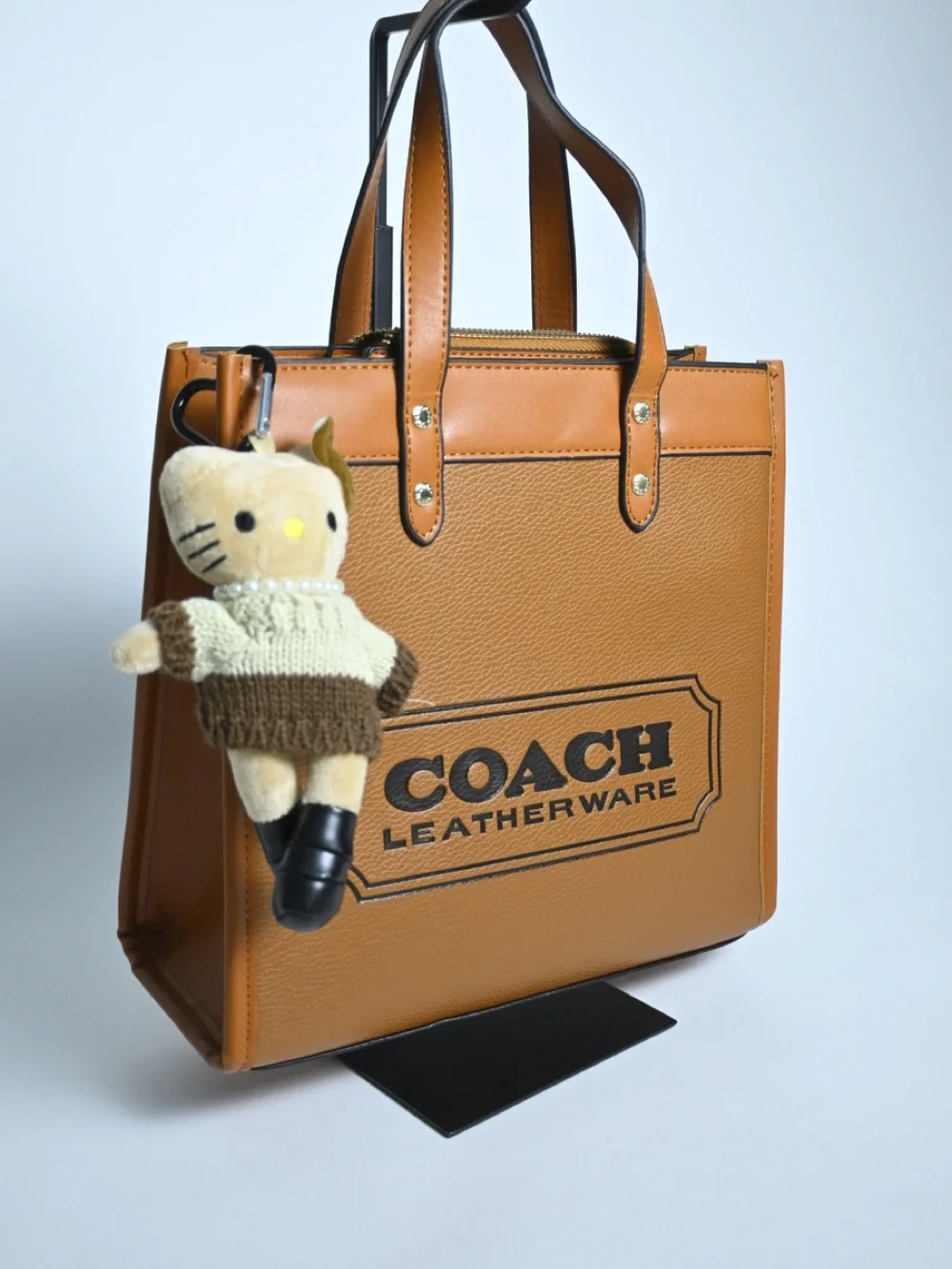 Coach Tan Pebbled Leather Logo Tote with Charm